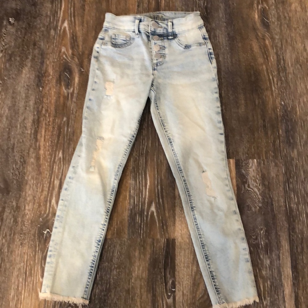 Girls justice distressed skinny jeans.